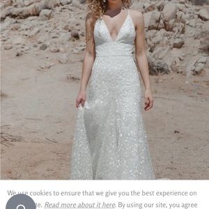 Jenny Yoo wedding dress sz 14.Beautiful leaf pattern.never worn still has tags.